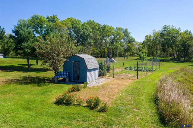 view of outbuilding with a yard