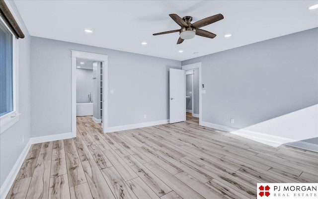 interior space featuring light hardwood / wood-style flooring and ceiling fan