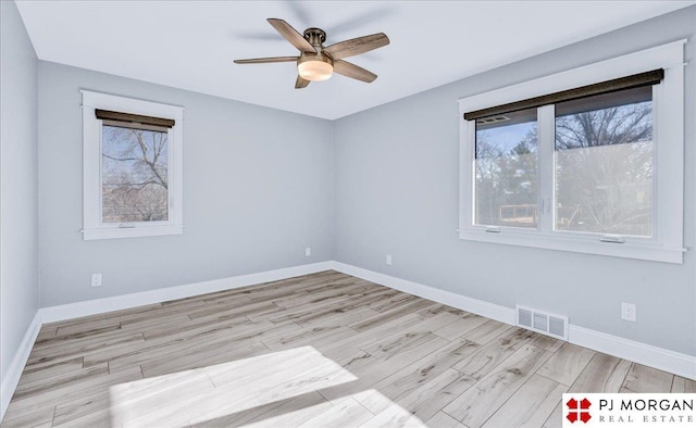 unfurnished room with light hardwood / wood-style floors and ceiling fan