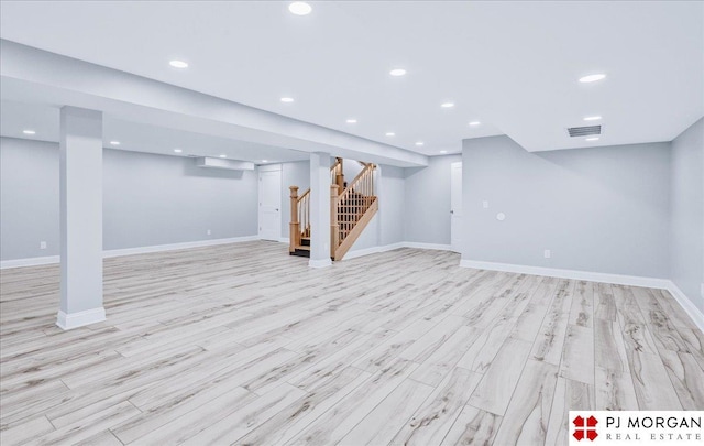 basement featuring light wood-type flooring