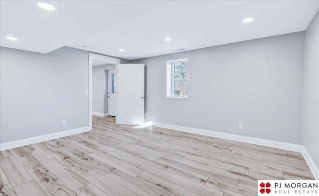 basement featuring light wood-type flooring