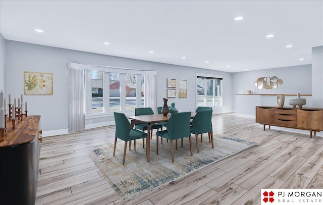 dining area with light wood-type flooring