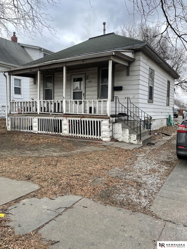 bungalow-style home with covered porch