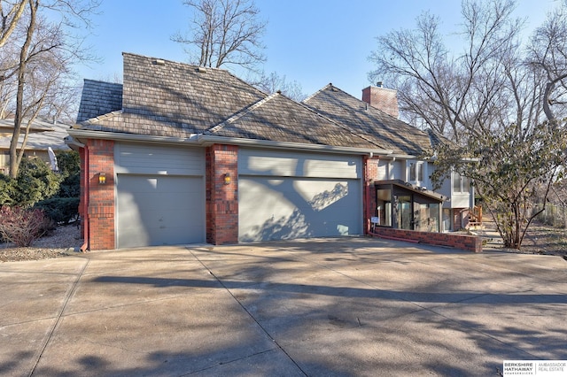 exterior space with a garage