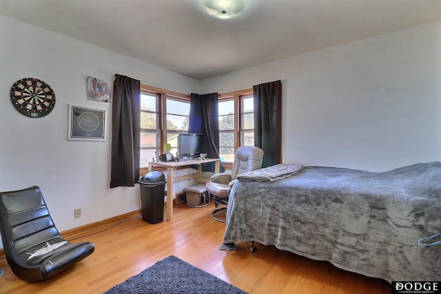 bedroom featuring light wood-type flooring