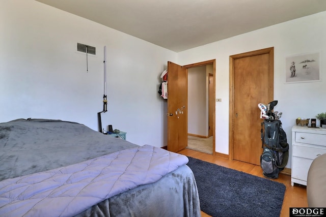 bedroom featuring light hardwood / wood-style flooring