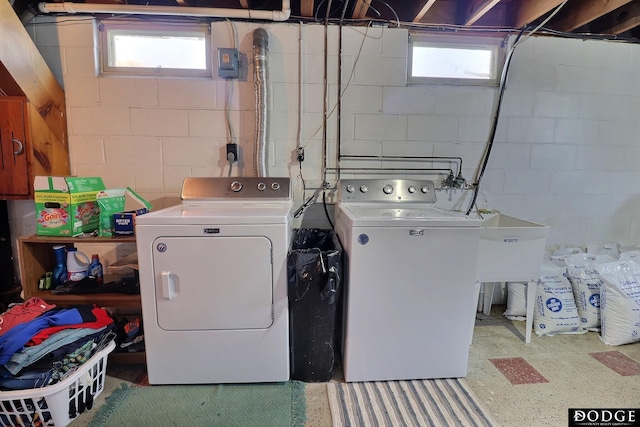 washroom with washer and dryer