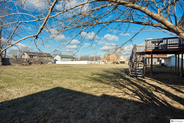 view of yard featuring a wooden deck