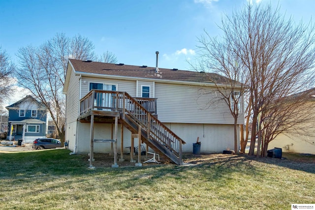 back of property featuring a wooden deck and a yard