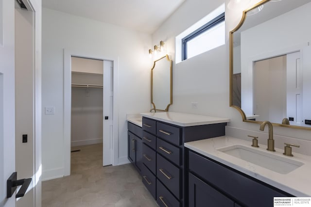 bathroom with vanity and tile patterned floors