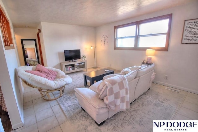 living room featuring light tile patterned floors