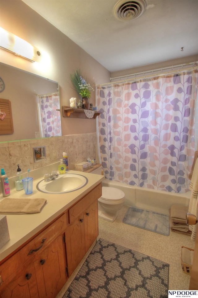 full bathroom with vanity, decorative backsplash, shower / bath combination with curtain, and toilet