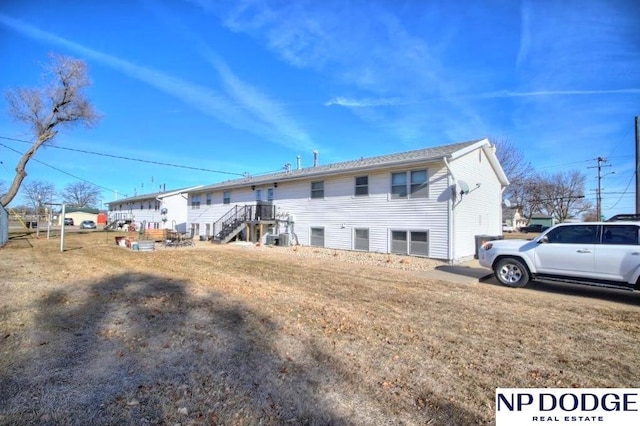 view of front of home with a front yard