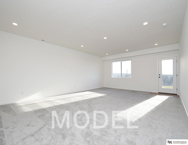 14803 Willow St, Bennington, NE 68007 - spare room featuring carpet, recessed lighting, baseboards, and a smoke detector