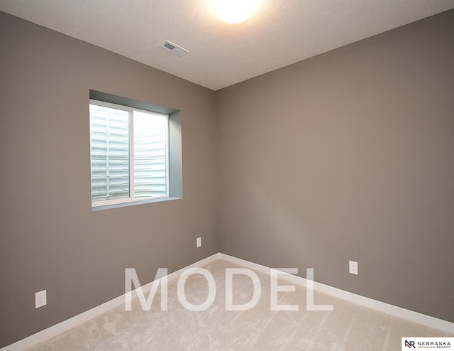 14803 Willow St, Bennington, NE 68007 - spare room with carpet floors and baseboards