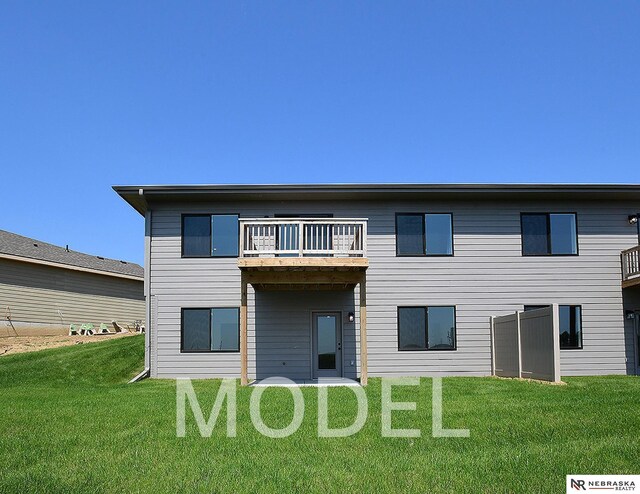 14803 Willow St, Bennington, NE 68007 - back of property with a balcony and a lawn