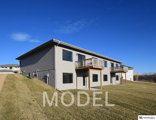 14803 Willow St, Bennington, NE 68007 - rear view of house featuring a lawn, central AC, and a deck