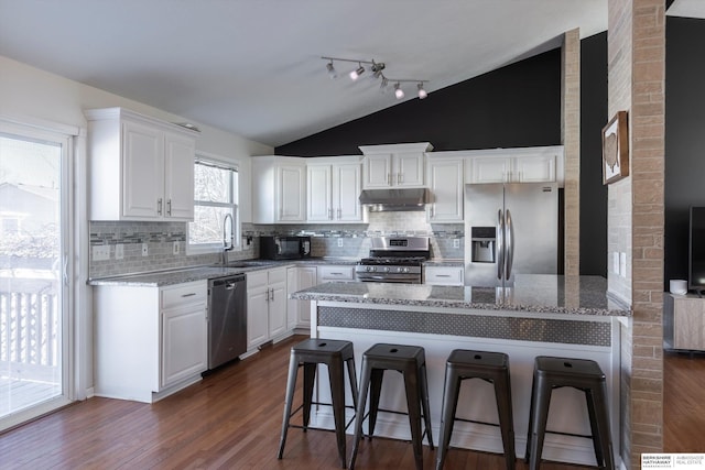 kitchen featuring white cabinetry, appliances with stainless steel finishes, and sink