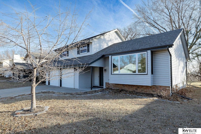 tri-level home featuring a garage