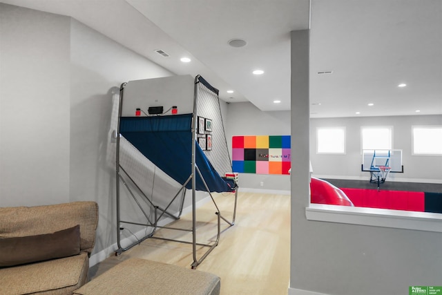 miscellaneous room with light wood-type flooring