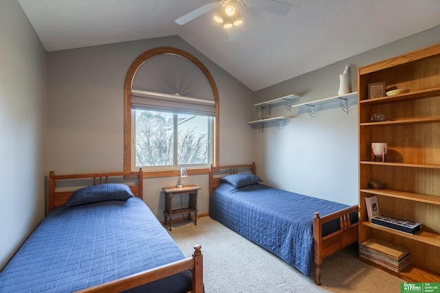 bedroom featuring light carpet, vaulted ceiling, and ceiling fan