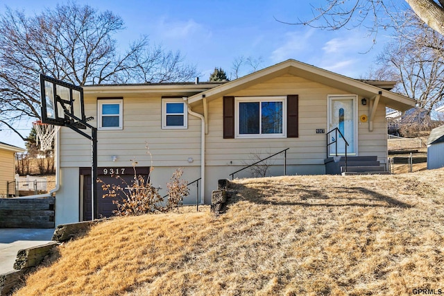 view of front of house with a garage