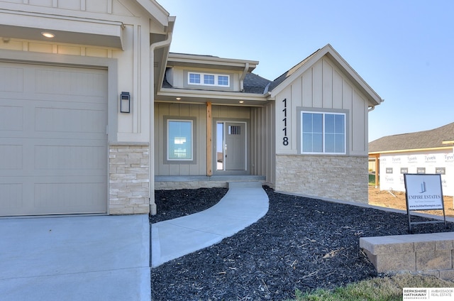 entrance to property featuring a garage