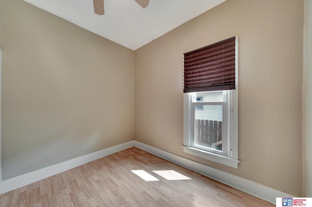 spare room featuring ceiling fan and light wood-type flooring