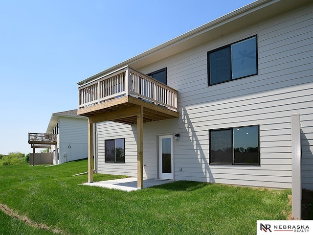 14806 Bruning St, Bennington, NE 68007 - rear view of property featuring a yard, a deck, and a patio
