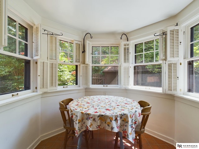 sunroom featuring a healthy amount of sunlight