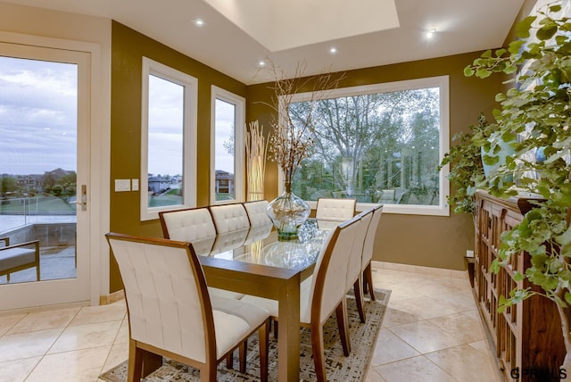 dining space with light tile patterned floors