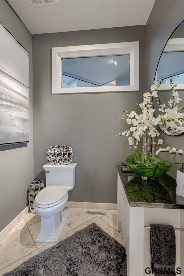 bathroom with sink and toilet