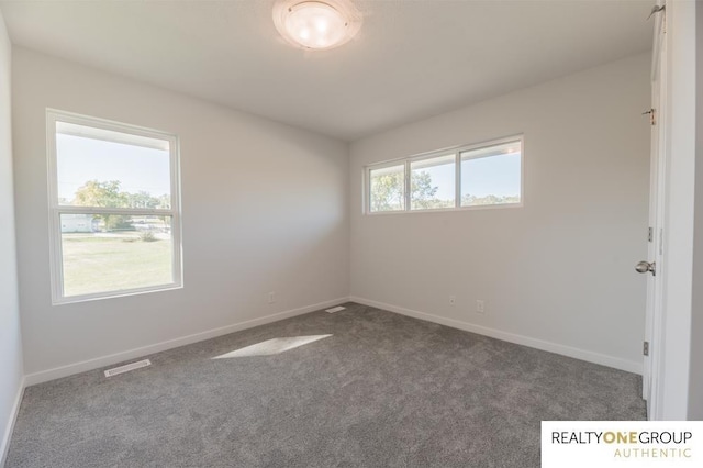 empty room with carpet floors