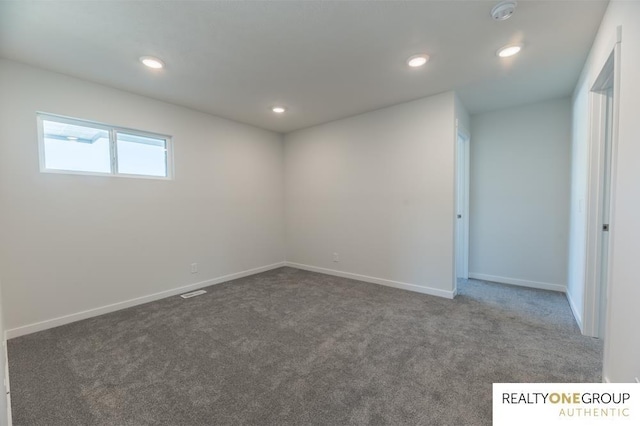 view of carpeted spare room