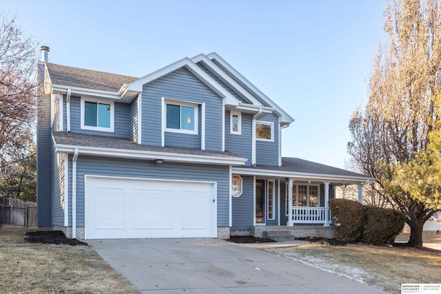 view of front of house featuring a garage and covered porch