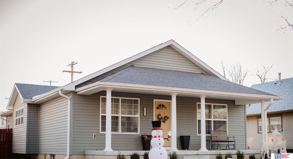 bungalow-style home with a porch