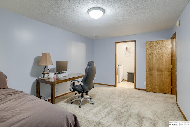 carpeted bedroom featuring a textured ceiling