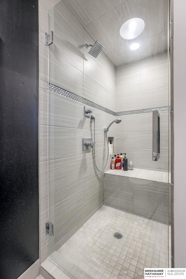 bathroom featuring an enclosed shower