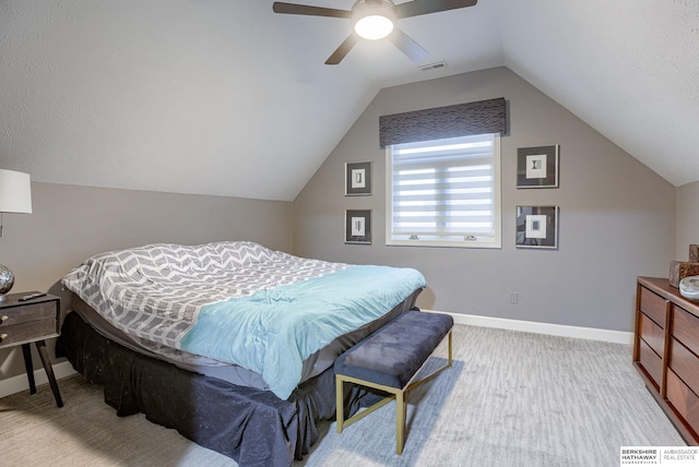 bedroom featuring ceiling fan and vaulted ceiling