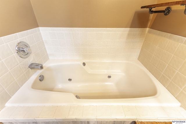 bathroom with a tub to relax in