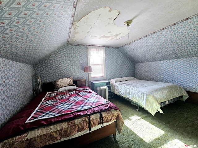 carpeted bedroom featuring lofted ceiling and wallpapered walls