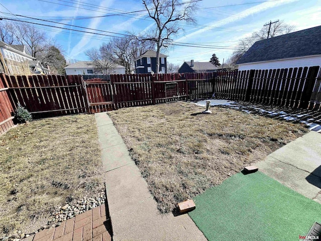 view of yard featuring a fenced backyard