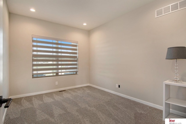 view of carpeted spare room