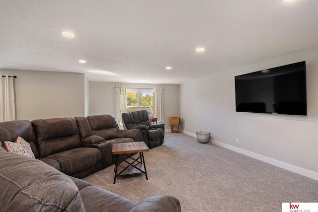 living room with light colored carpet and a textured ceiling