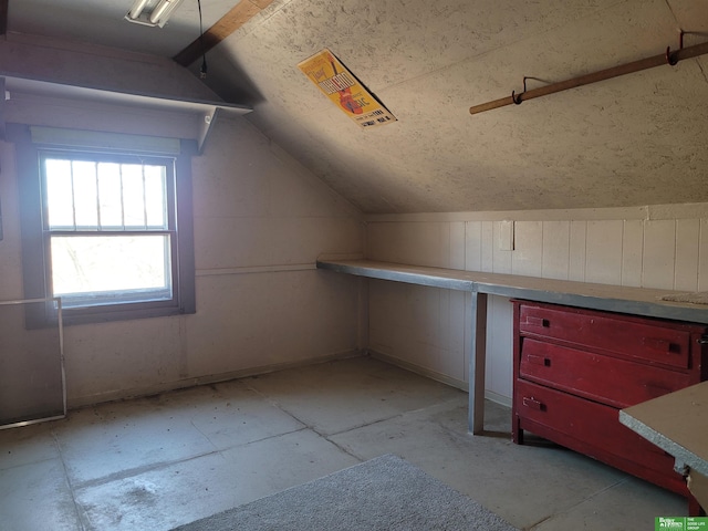 bonus room featuring vaulted ceiling