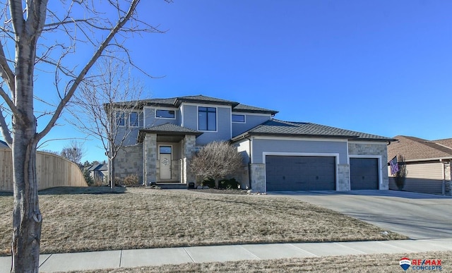 view of front of home with a garage