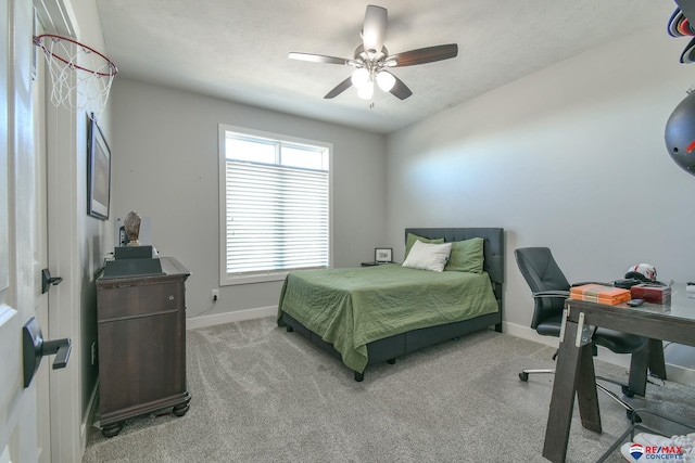 bedroom featuring ceiling fan and light carpet