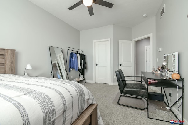 bedroom with ceiling fan and carpet