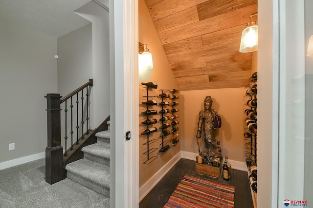 wine area with wood ceiling and lofted ceiling