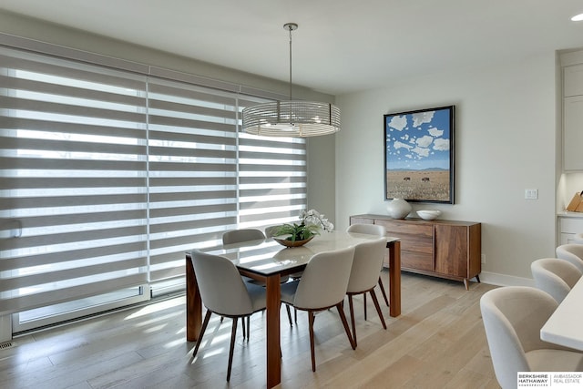 dining room featuring light hardwood / wood-style flooring